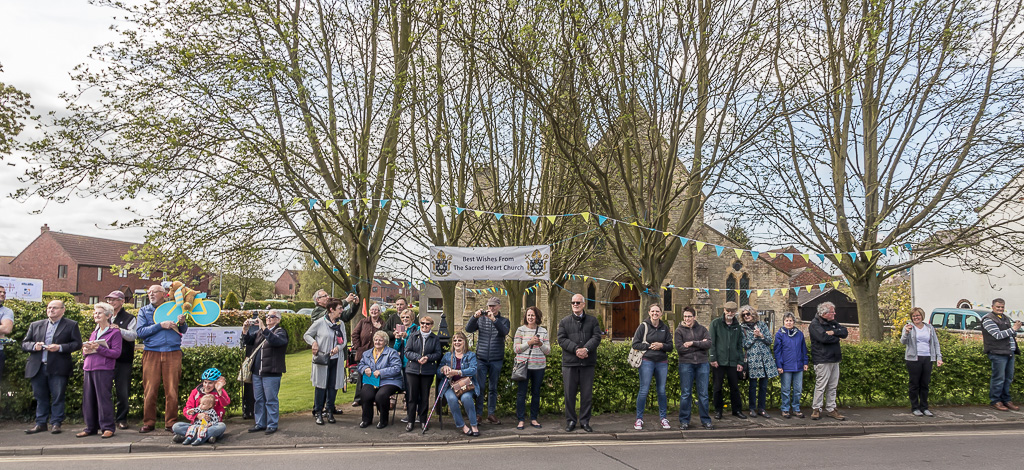 spectators outside our church